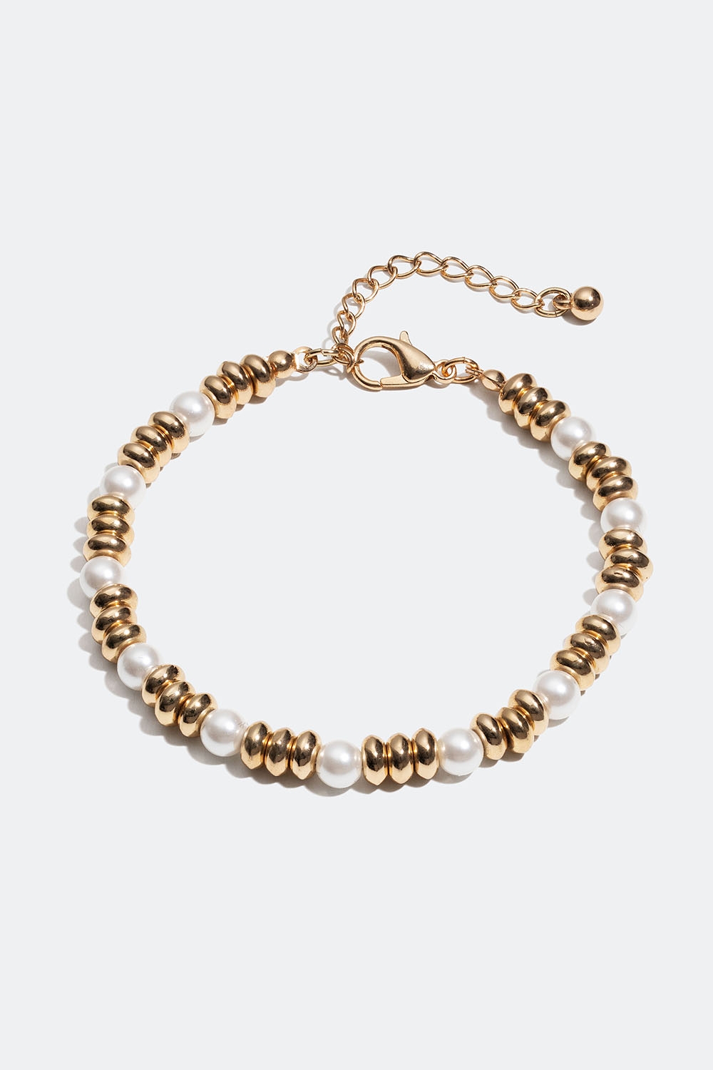 Armband med guldfärgade och vita pärlor i gruppen Smycken / Armband / Tunna hos Glitter (251000912002)