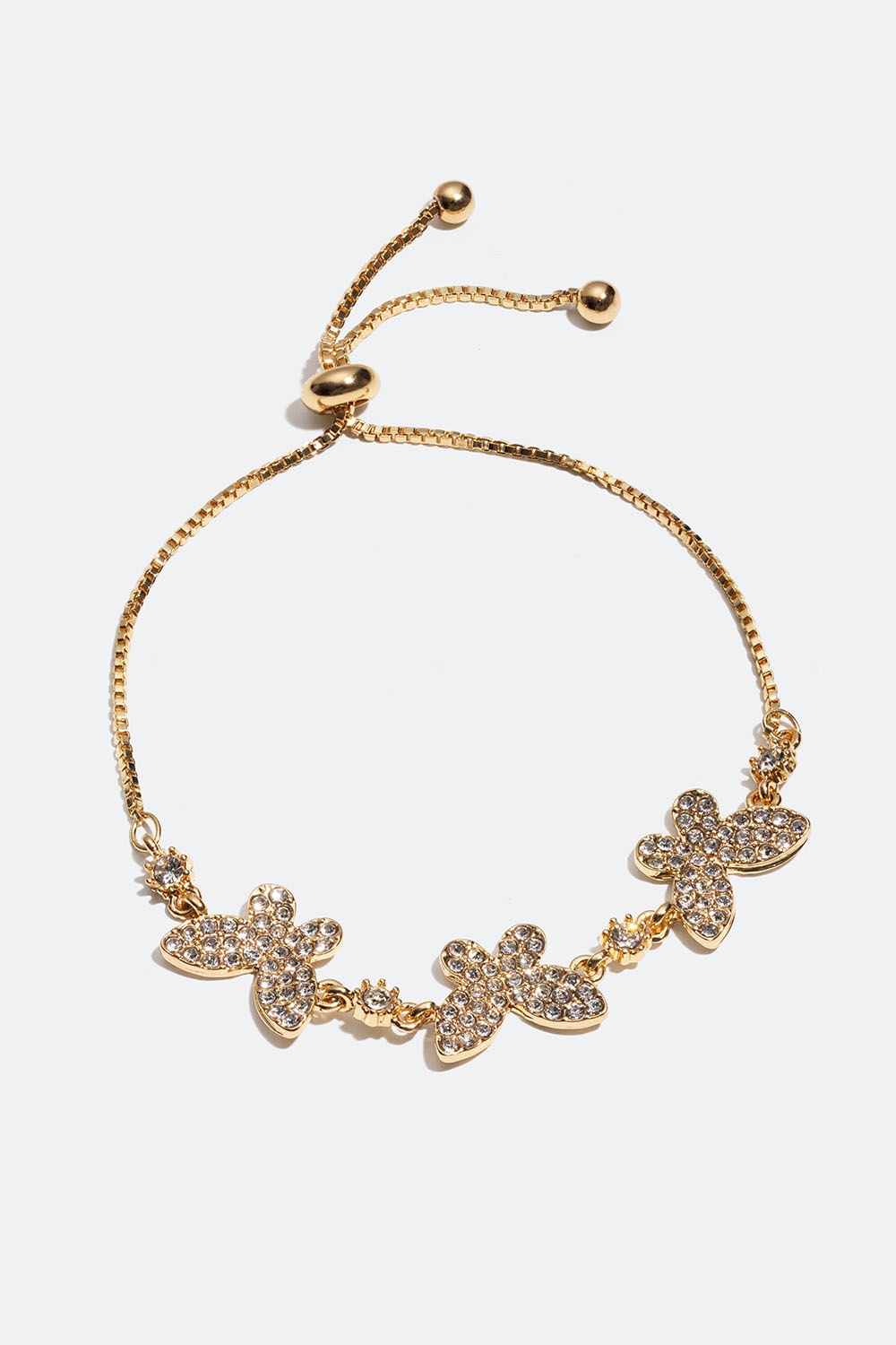Guldfärgat armband med fjärilar och glasstenar i gruppen Smycken / Armband / Tunna hos Glitter (251000940202)