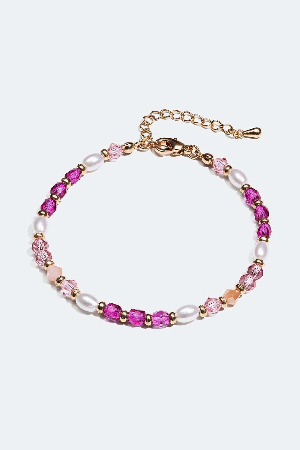 Armband i guldfärgad metall med rosa pärlor i gruppen Smycken / Armband / Tunna hos Glitter (251000955402)