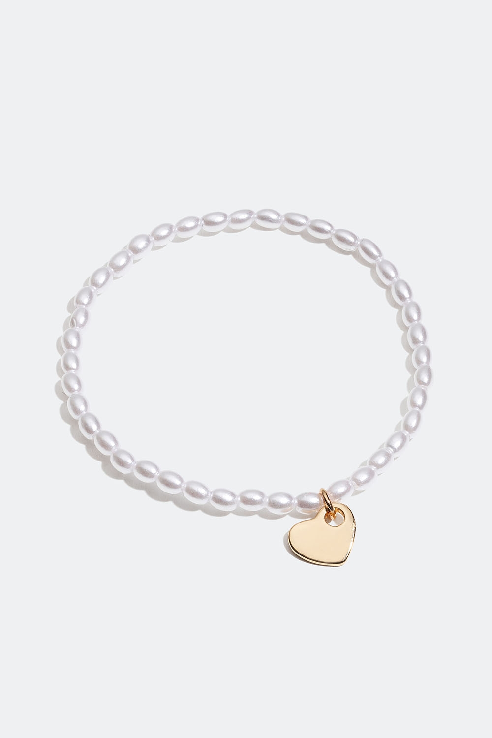 Armband med vita pärlor och hjärta i gruppen Smycken / Armband / Tunna hos Glitter (251000973001)