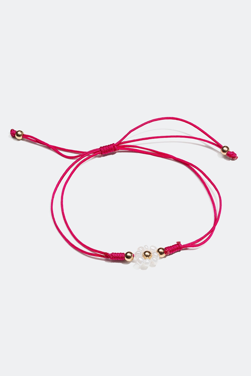 Rosa armband med vit blomma i gruppen Smycken / Armband / Tunna hos Glitter (251001035502)