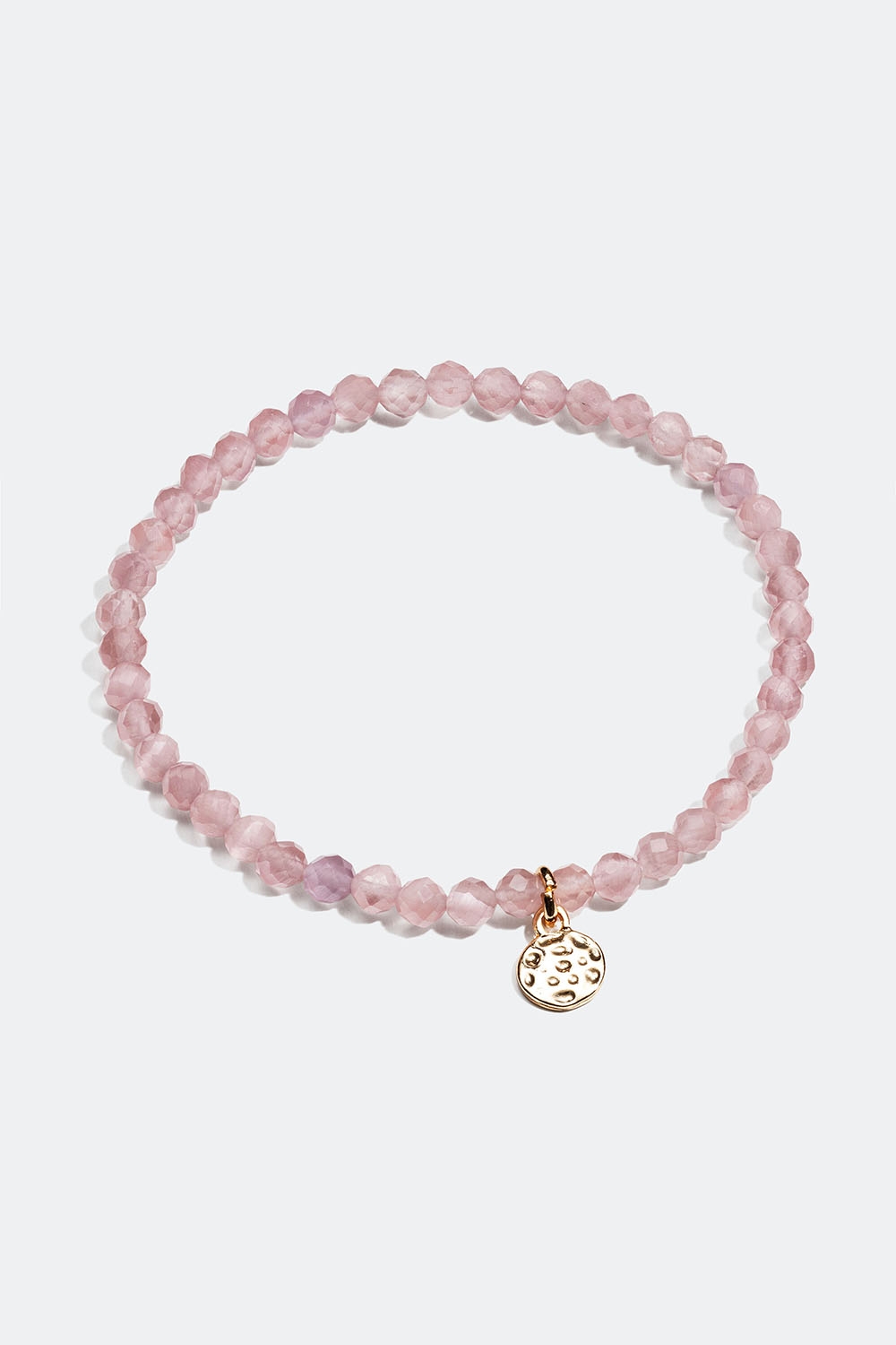Elastiskt armband med rosa glaspärlor och guldfärgad berlock i gruppen Smycken / Armband / Tunna hos Glitter (251001046502)