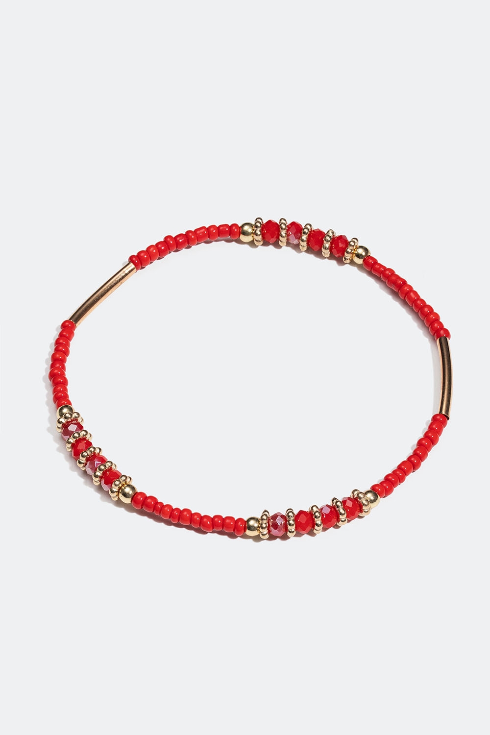 Elastiskt armband med röda pärlor i gruppen Smycken / Armband / Tunna hos Glitter (251001116002)