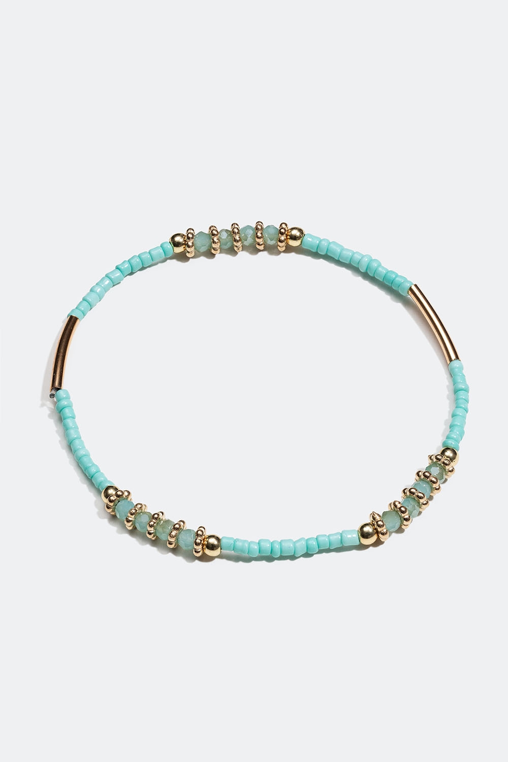 Elastiskt armband med turkosa pärlor i gruppen Smycken / Armband / Tunna hos Glitter (251001117302)
