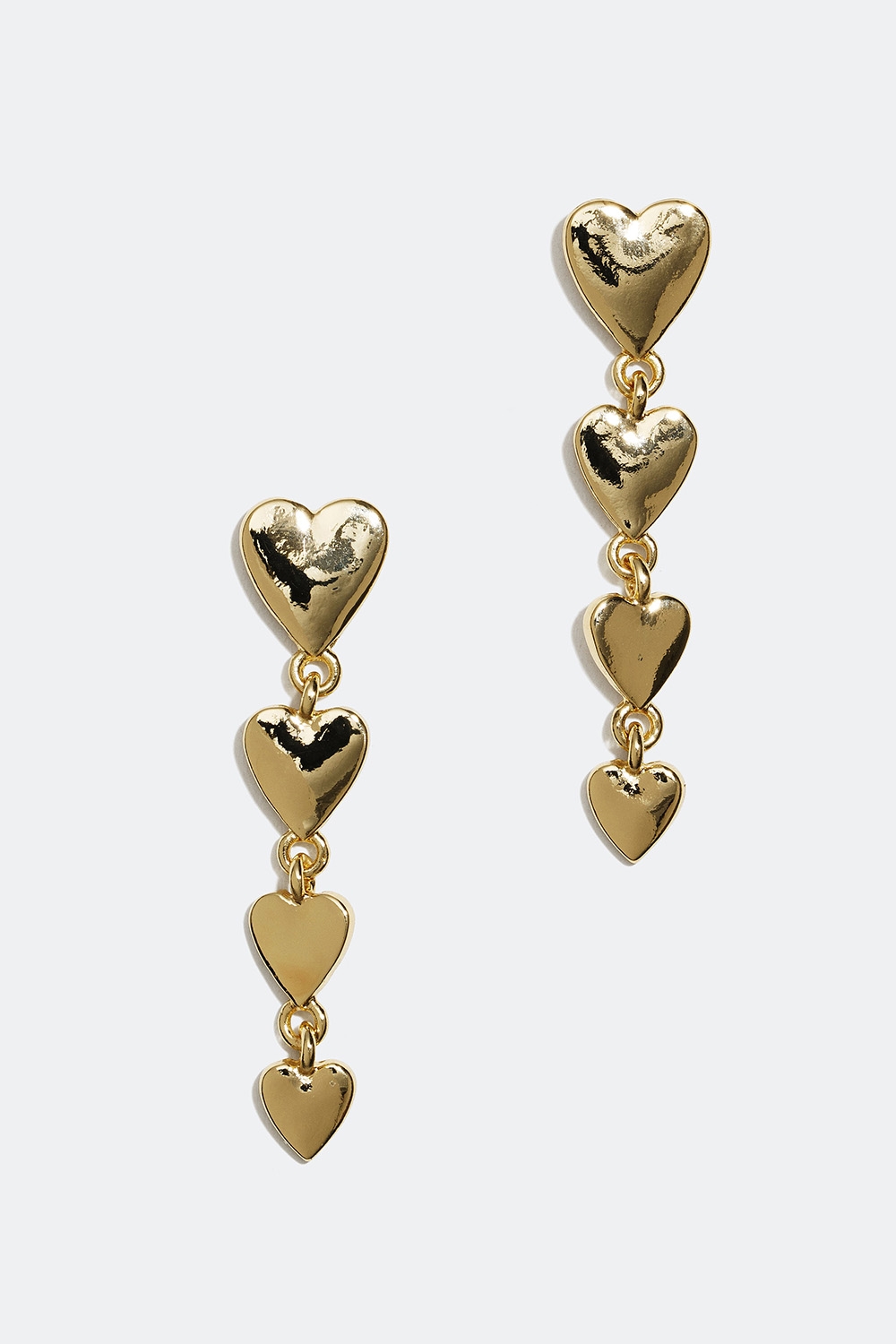 Långa guldfärgade örhängen med släta hjärtan i gruppen Smycken / Örhängen hos Glitter (253004682002)