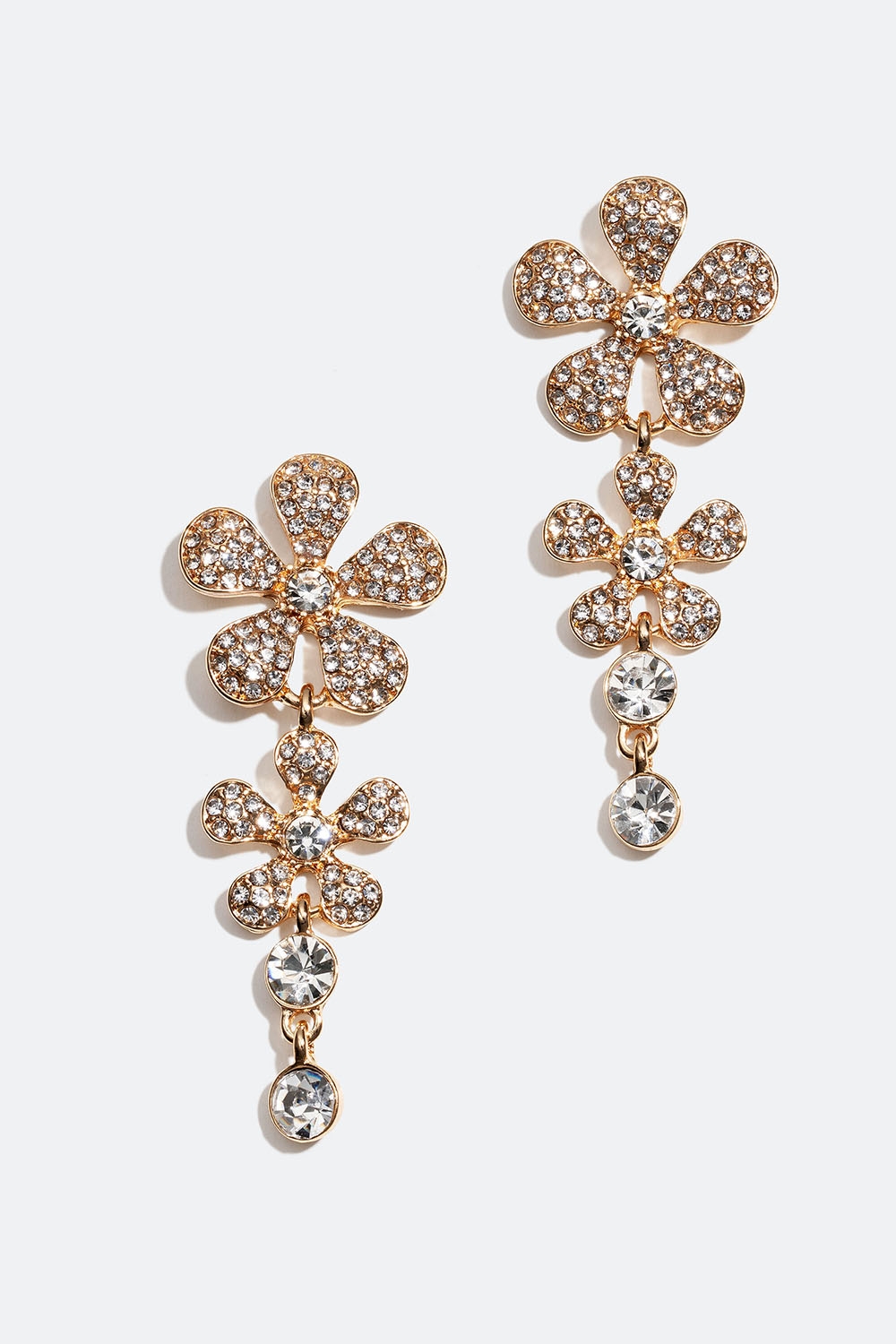 Guldfärgade örhängen med design av blommor med glasstenar i gruppen Smycken / Örhängen hos Glitter (253006120202)