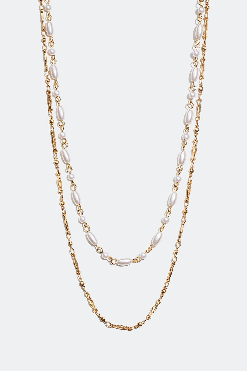 Guldfärgat dubbelhalsband med ovala och runda pärlor i gruppen Smycken / Halsband hos Glitter (254001402002)