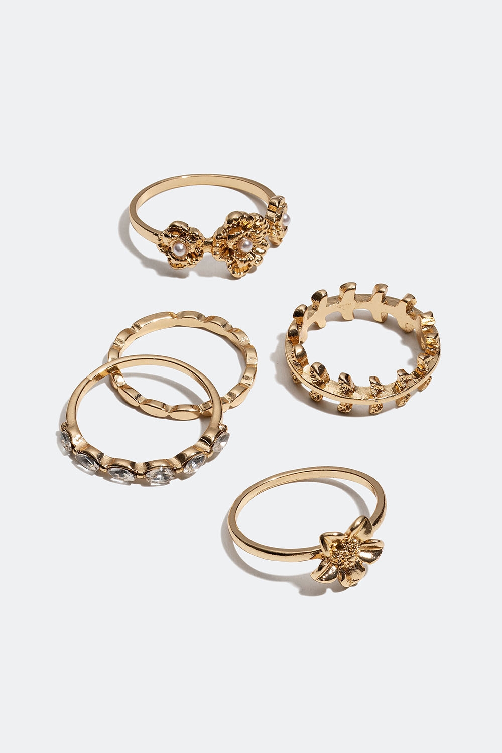 Guldfärgade ringar med blommor och glasstenar, 5-pack i gruppen Smycken / Ringar / Flerpack hos Glitter (256000992)