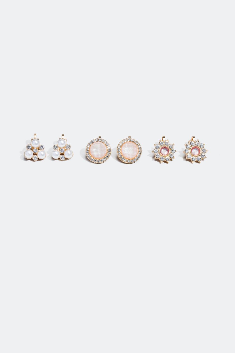 3-pack clipsörhängen i rosa, vita och guldfärgade nyanser i gruppen Smycken hos Glitter (324484)