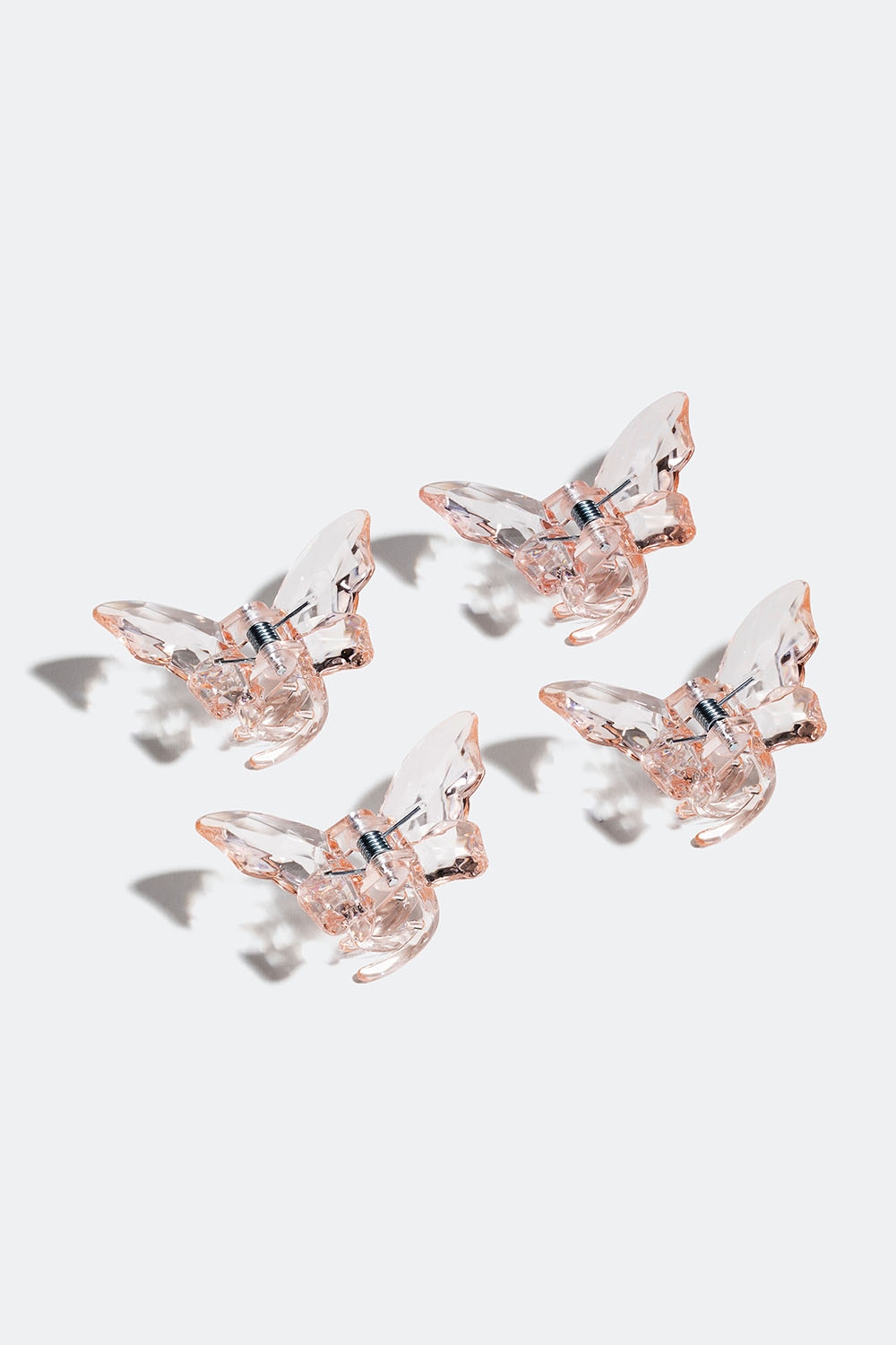 Små rosa hårklämmor med fjärilar, 4-pack i gruppen Håraccessoarer / Spännen & klämmor / Flerpack hos Glitter (331001565400)