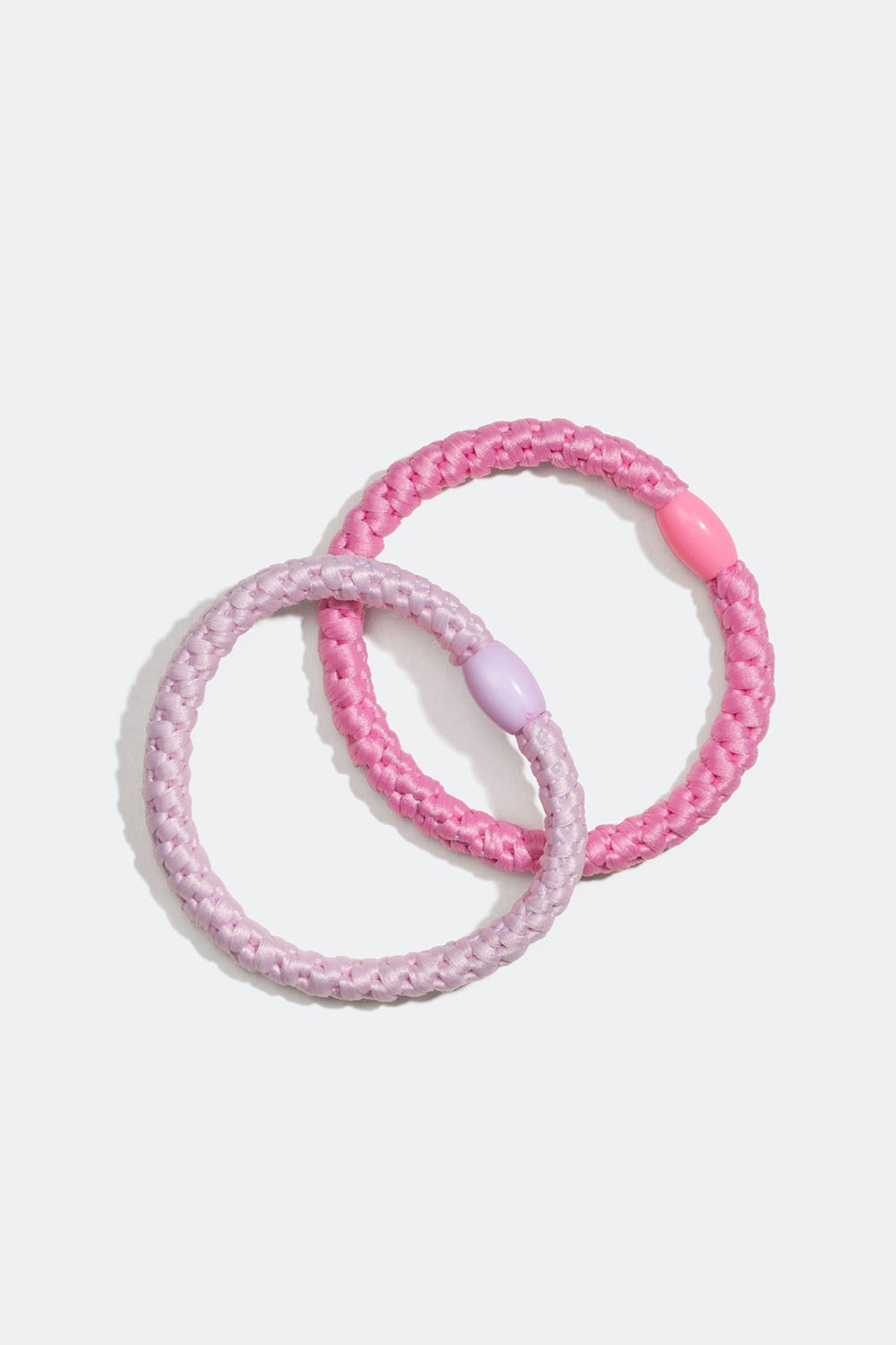 Små flätade hårsnoddar i rosa, 2-pack i gruppen Barn / Barnhåraccessoarer / Barnhårsnoddar hos Glitter (403000065400)