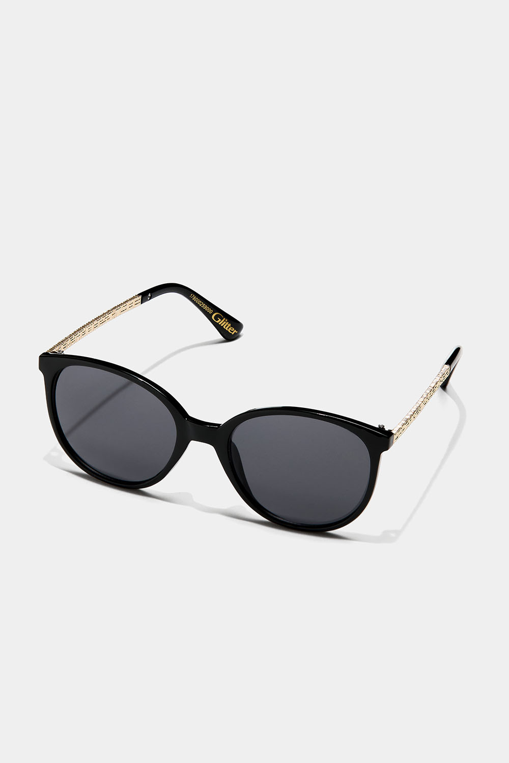 Svarta cateye solglasögon med guldiga detaljer
