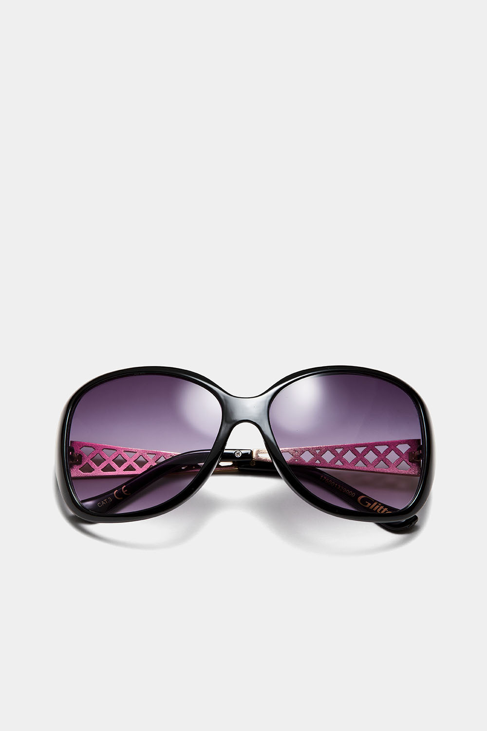 Oversize solglasögon med mönstrade skalmar