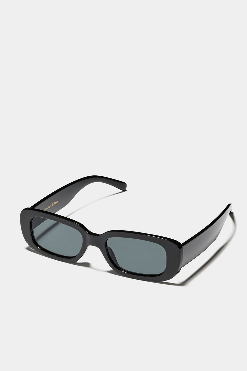 Svarta rektangulära solglasögon med rundade kanter