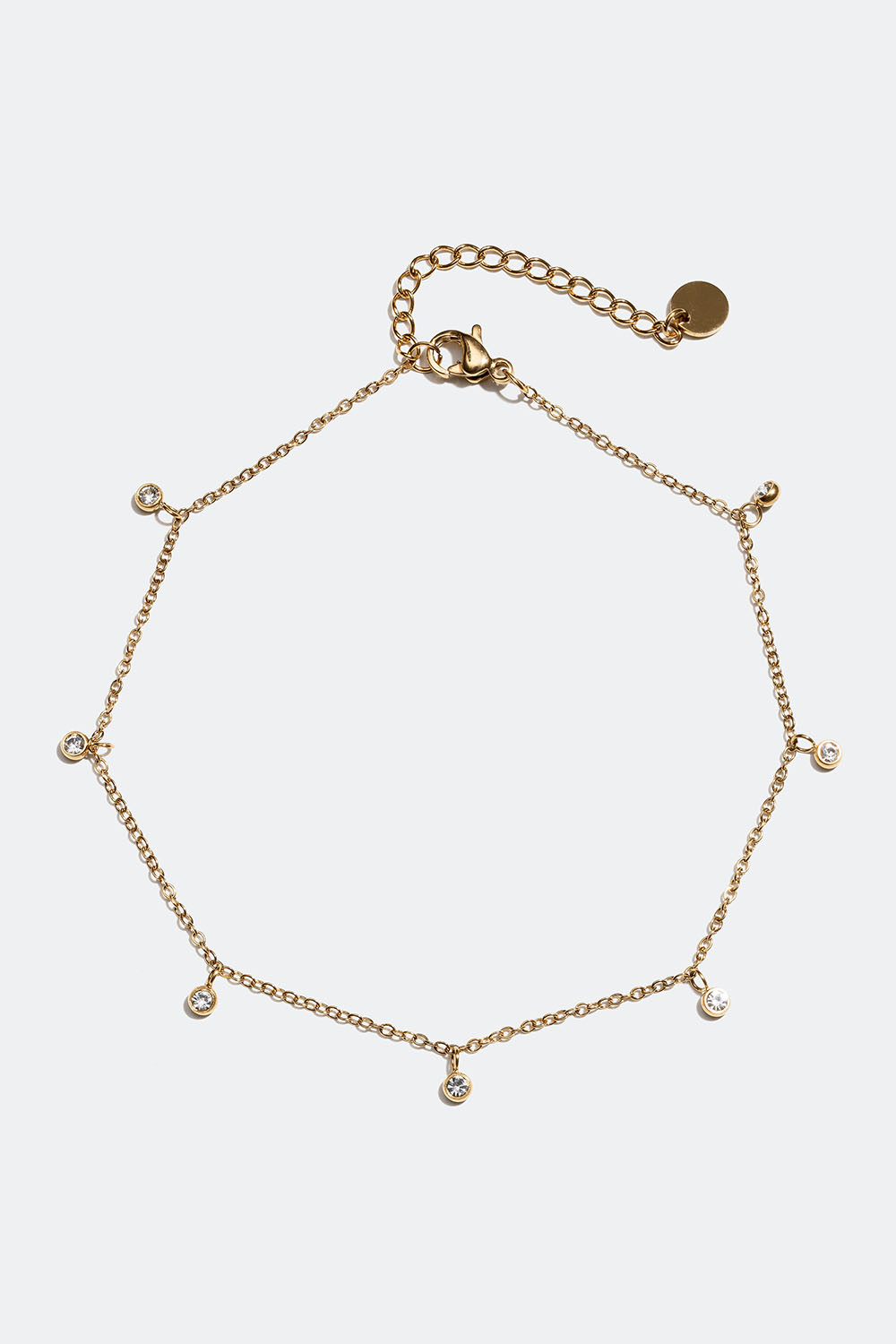 Fotlänk i stål med 18k guld med Cubic Zirconia stenar