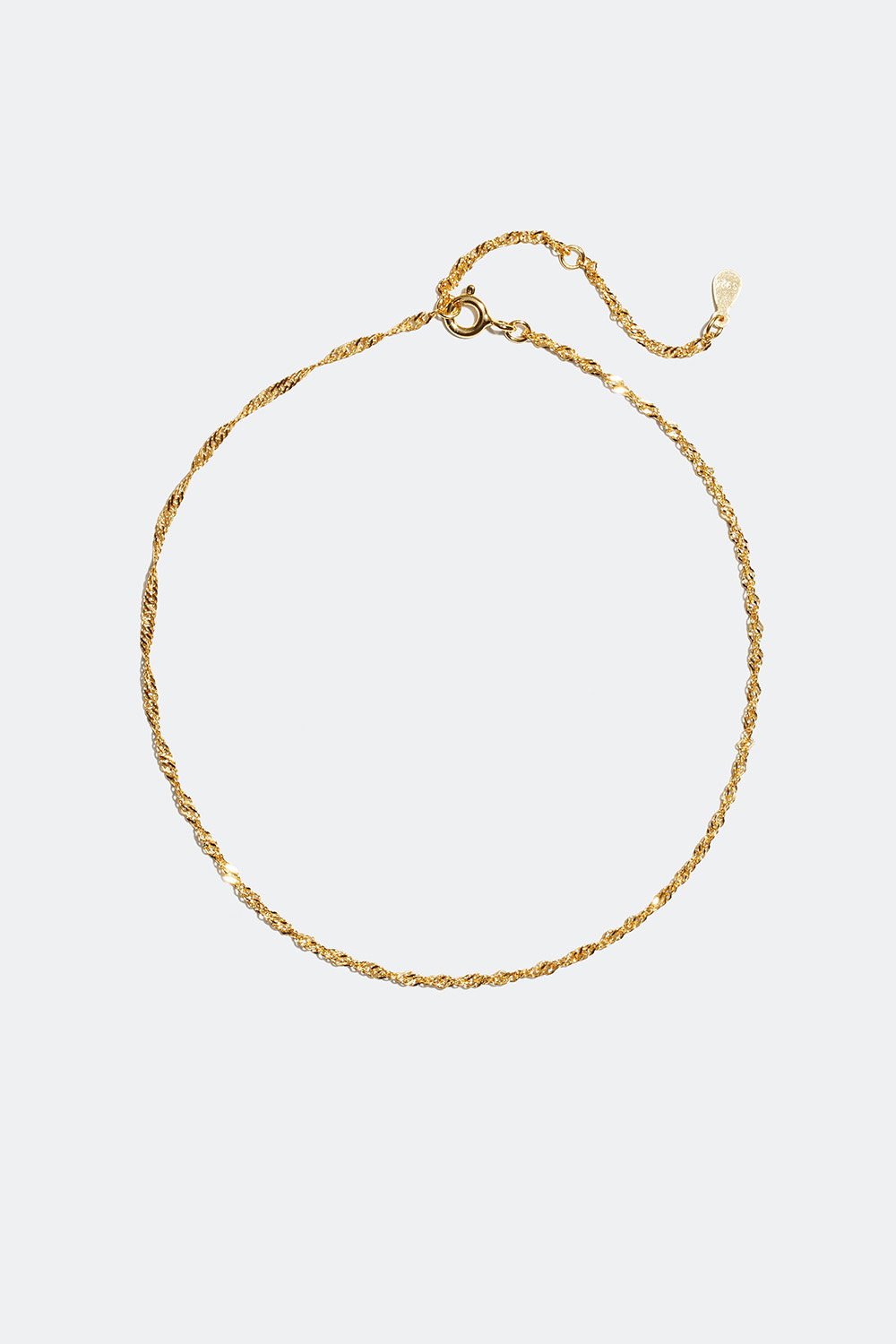 Vristlänk förgylld i 18k guld, vriden