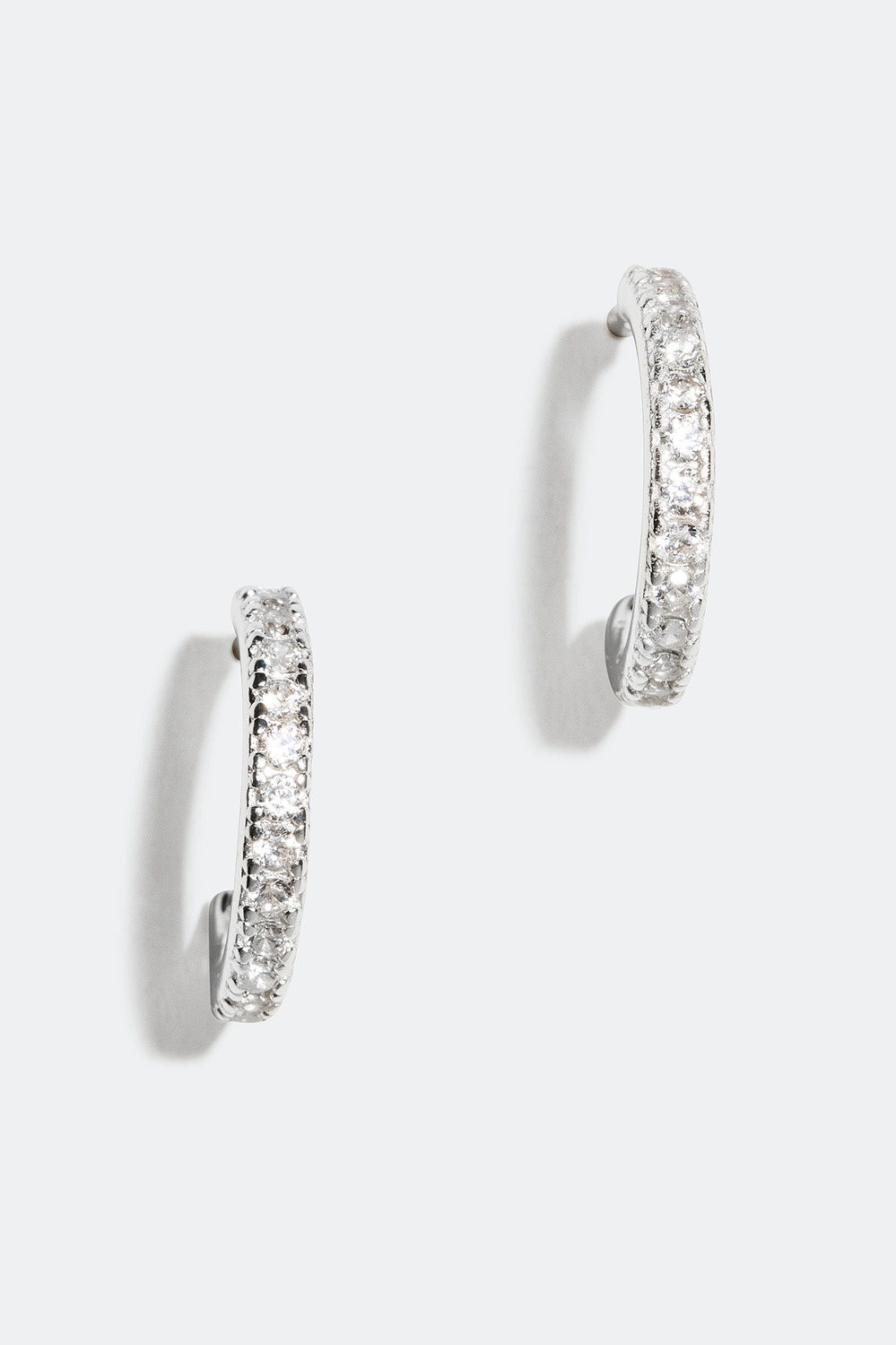 Hoops i äkta silver med stenar runt om